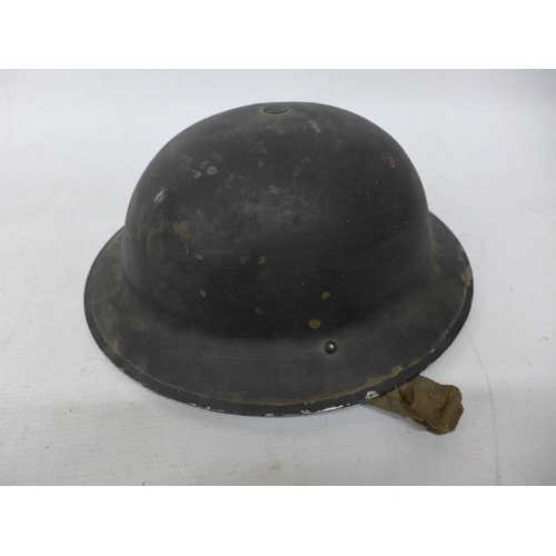 423 - A RARE WORLD WAR II BRITISH HOME GUARD RESCUE METAL HELMET, COMPLETE WITH LINER