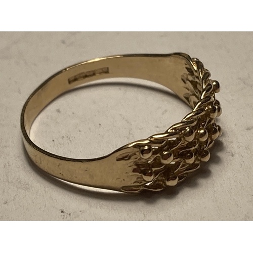 697 - A 9 CARAT GOLD RING WITH PLAIT DESIGN SIZE P GROSS WEIGHT 1.89 GRAMS