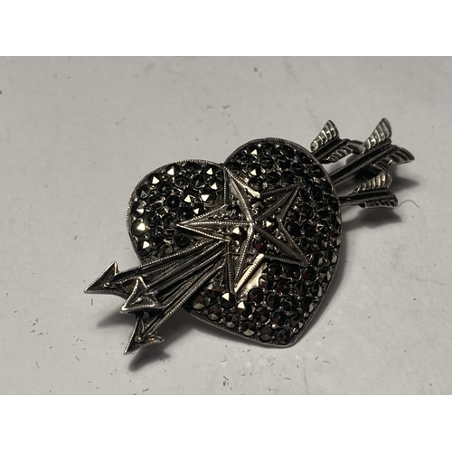 706 - A SILVER MARCASITE STYLE RING AND BROOCH