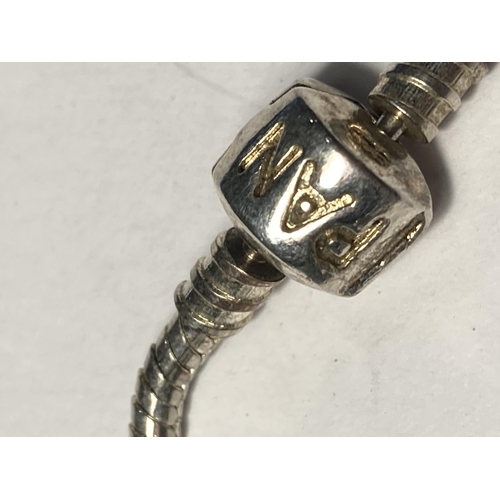 710 - A PANDORA SILVER BRACLET WITH ELEVEN VARIOUS CHARMS