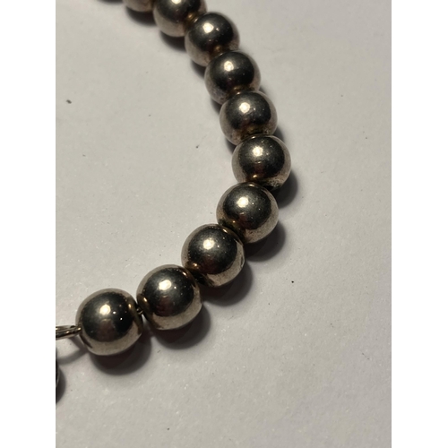 716 - A HEAVY MARKED 925 BALL BRACELET