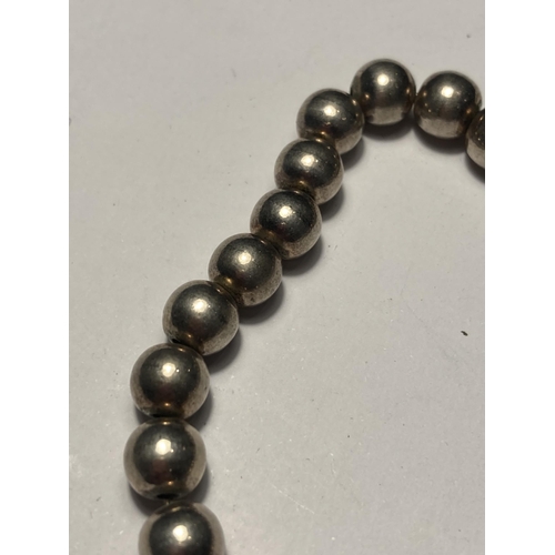 716 - A HEAVY MARKED 925 BALL BRACELET