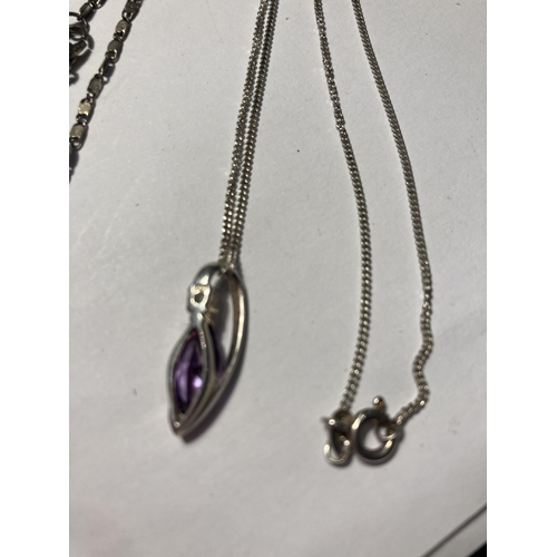 718 - TWO SILVER NECKLACES WITH PENDANTS