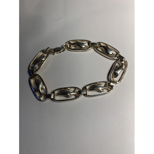 744 - THREE VARIOUS SILVER BRACELETS