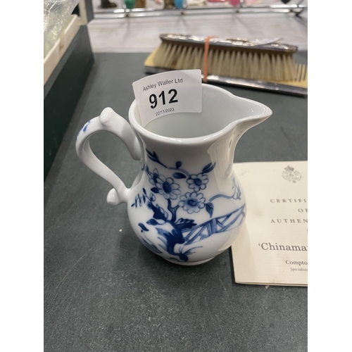 912 - A ROYAL WORCESTER FOR COMPTON WOODHOUSE SMALL BLUE AND WHITE JUG WITH CERTIFICATE