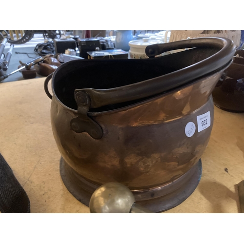 932 - A COPPER COAL BUCKET PLUS TWO BRASS FIRE DOGS