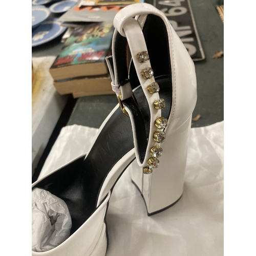 948 - A PAIR OF ITALIAN WHITE HIGH HEELED PLATFORM SHOES, MARKED VERSACE WITH DUST BAG - NO PROVENANCE OR ... 