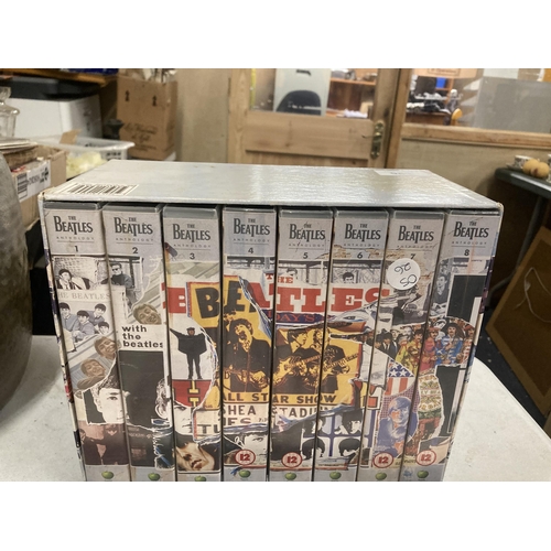 963 - THE BEATLES ANTHOLOGY VHS TAPES IN EIGHT PARTS AND A LARGE BEATLES HARDBACK BOOK