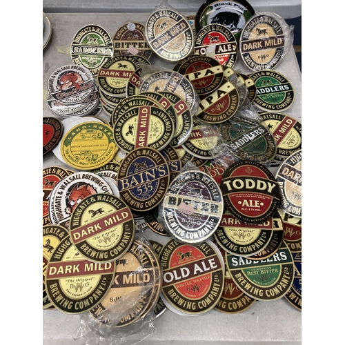 990 - A COLLECTION OF PUB BEER BADGES / COASTERS ETC