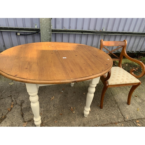 3029 - A MODERN OVAL PINE EXTENDING DINING TABLE, 50 X 39