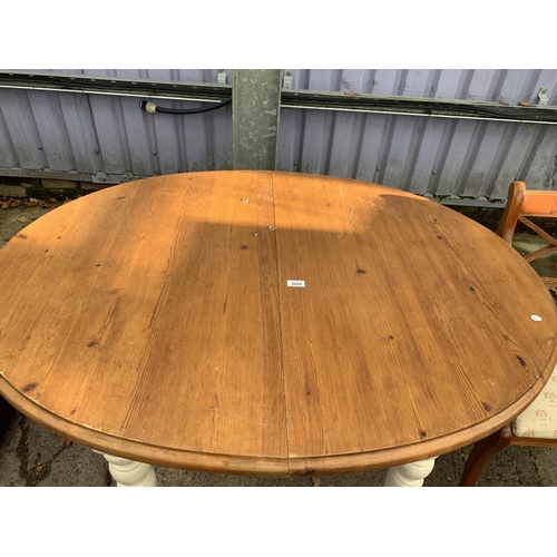 3029 - A MODERN OVAL PINE EXTENDING DINING TABLE, 50 X 39