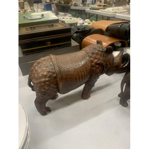 238A - TWO VINTAGE WOODEN ANIMAL FIGURES TO INCLUDE A CARVED RHINOCEROS