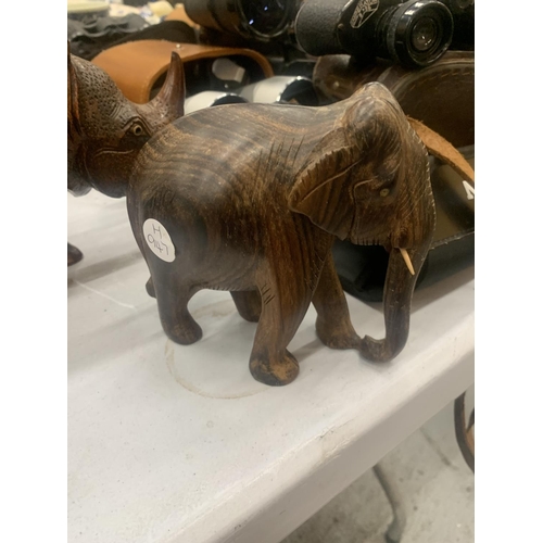 238A - TWO VINTAGE WOODEN ANIMAL FIGURES TO INCLUDE A CARVED RHINOCEROS