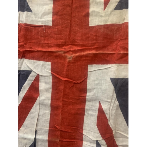 440A - A UNION JACK FLAG APPROX 63CM X 104CM