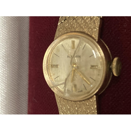 504A - A VINTAGE MARVIN LADIES' WRIST WATCH WITH 9 CARAT GOLD CASE