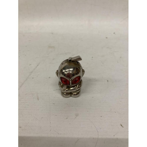 804A - A VINTAGE WHITE METAL LIGHTER IN THE SHAPE OF AN ALIEN WITH RED EYES, HEIGHT 5CM