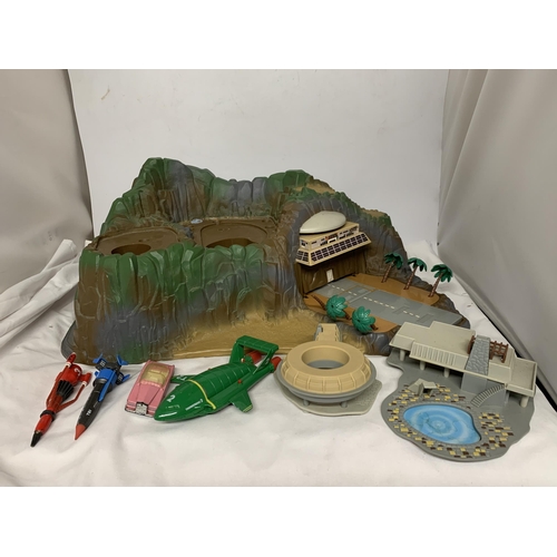 391 - A THUNDERBIRDS TRACEY ISLAND PLAYSET WITH A SET OF RESCUE SHIPS ETC.,