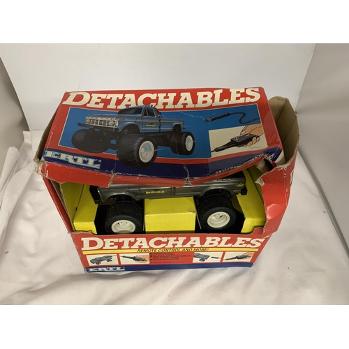 397 - A BOXED 1986 ERTL DETACHABLES REMOTE CONTROL FORD PICKUP TRUCKS