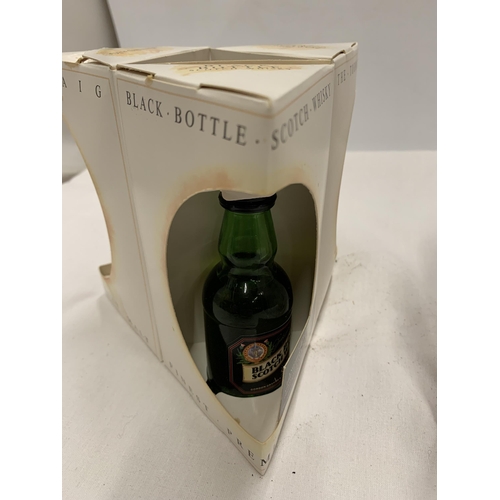 558 - TWO BLACK BOTTLE MINIATURE WHISKY GIFT SETS TO INCLUDE TORMORE GLENLIVET & LAPHROAIG