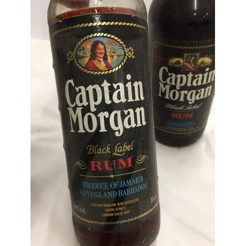 634 - THREE BOTTLES - LAMB'S NAVY RUM, 2 X CAPTAIN MORGAN BLACK LABEL RUM