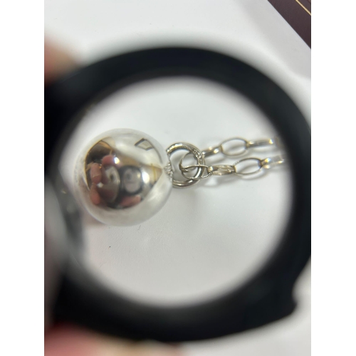 528 - A BOXED .925 SILVER NECKLACE WITH ORB BALL CHARM, 18