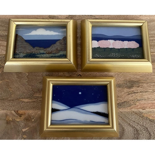 54 - A SET OF THREE PORSGRUND, NORWAY FRAMED PORCELAIN TILES BY ANNE MARIE ODEGAARD