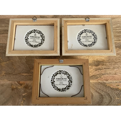 54 - A SET OF THREE PORSGRUND, NORWAY FRAMED PORCELAIN TILES BY ANNE MARIE ODEGAARD