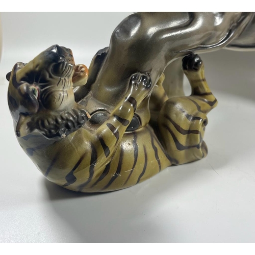 68 - A LARGE 1970S ITALIAN POTTERY SCULPTURE OF AN ELEPHANT BEING ATTACKED BY TIGERS, LENGTH 49 CM