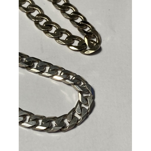 743 - TWO SILVER WRIST CHAINS