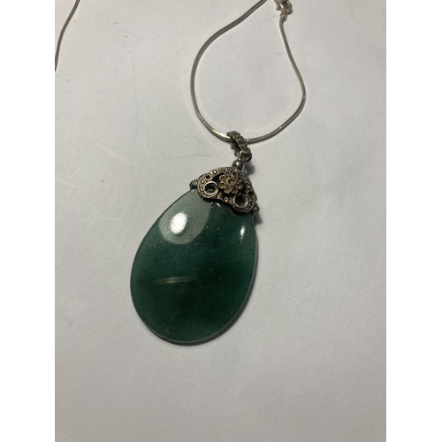 752 - TWO SILVER AND JADE TYPE NECKLACES