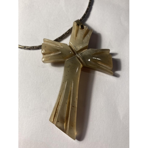 765 - A BONE CROSS AND SILVER NECKLACE