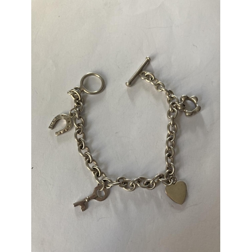 771 - A SILVER T-BAR CHARM BRACELET