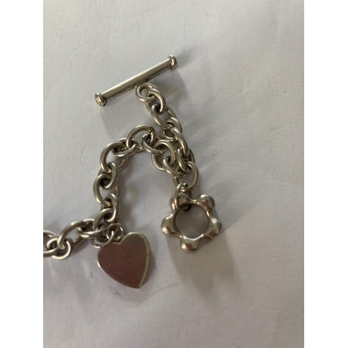 771 - A SILVER T-BAR CHARM BRACELET