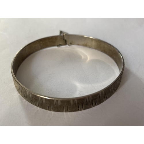 772 - TWO SILVER BANGLES