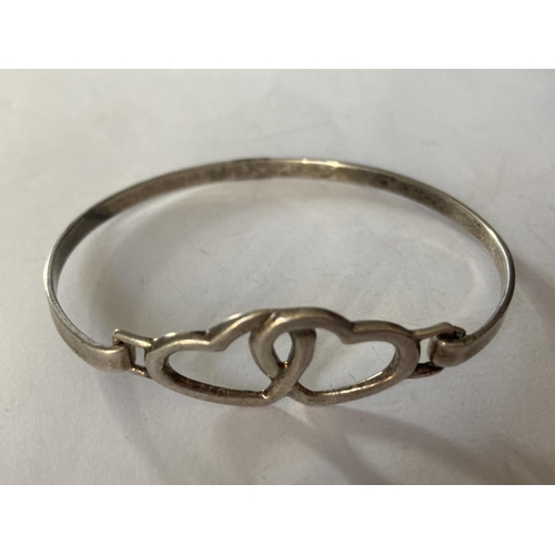 772 - TWO SILVER BANGLES