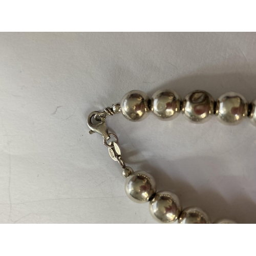 774 - TWO SILVER BRACELETS (BEADS NOT SILVER ONLY THE CHAIN)