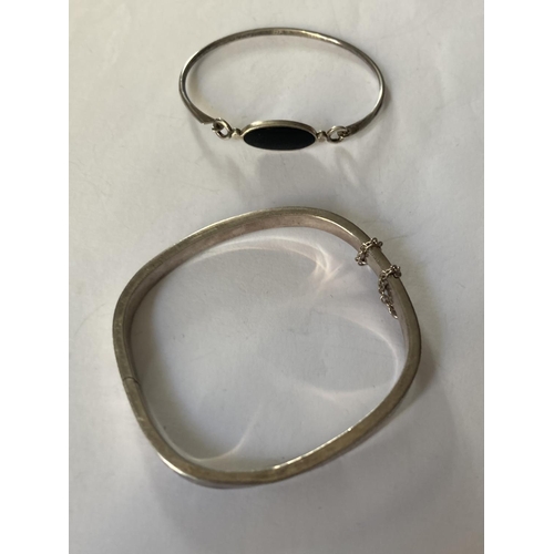 779 - TWO SILVER BANGLES