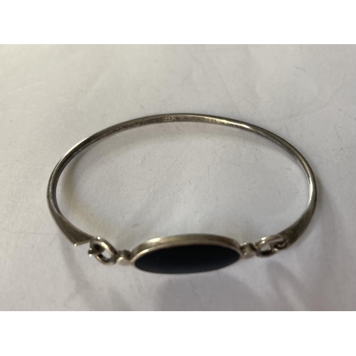 779 - TWO SILVER BANGLES