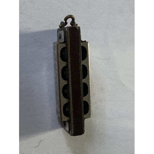 821 - A MINI HOHNER MOUTH ORGAN