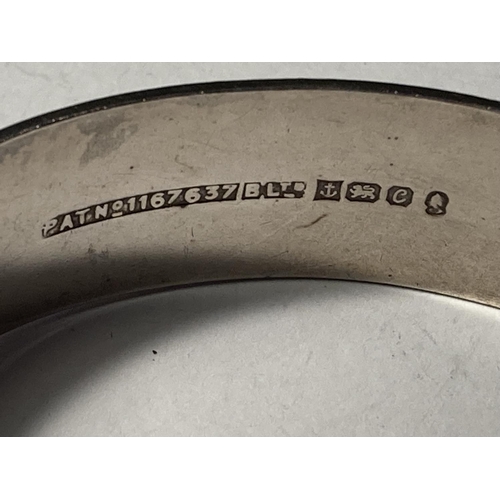 823 - A HALLMARKED BIRMINGHAM SILVER BANGLE