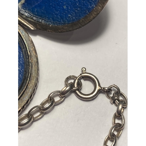 825 - A HALLMARKED BIRMINGHAM SILVER LOCKET WITH CHAIN