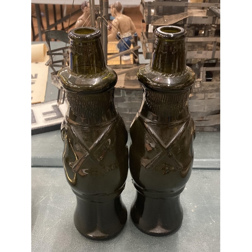 113 - A PAIR OF VINTAGE GERMAN BEER BOTTLES IN THE SHAPE OF TYROLIAN MEN