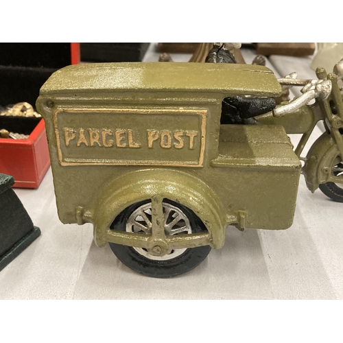 159 - AN UNUSUAL HEAVY CAST MOTOR BIKE, POSTMAN AND PARCEL POST SIDE CAR