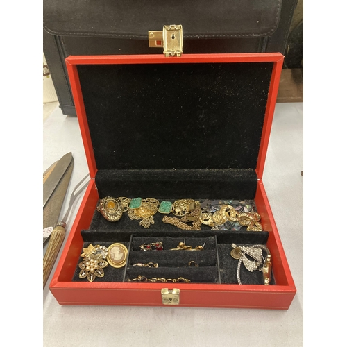 163 - A BOX OF ASSORTED COSTUME JEWELLERY