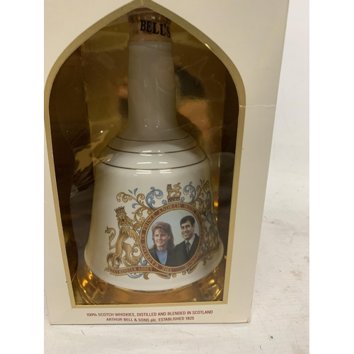 519 - A BOXED 75CL BOTTLE - WHYTE & MACKAY DELUXE BLENDED SCOTCH WHISKY IN CERAMIC DECANTER