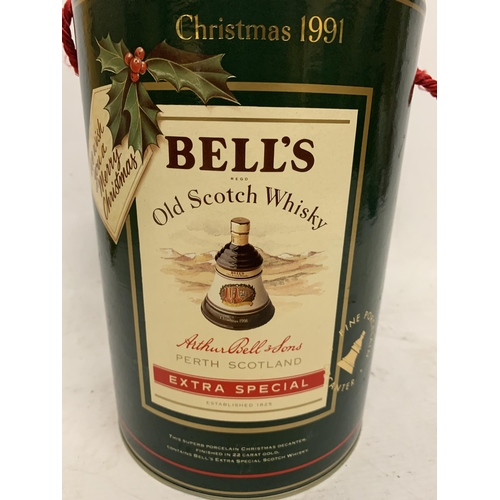 694 - A BOXED 70CL BOTTLE - BELLS CHRISTMAS 1991 OLD SCOTCH WHISKY DECANTER