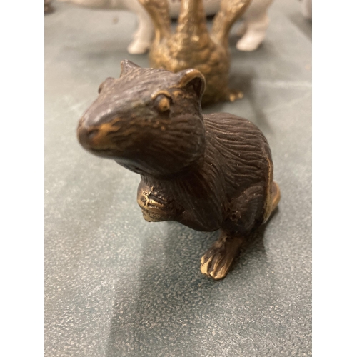 108A - A SMALL BRONZE MODEL OF A MOUSE