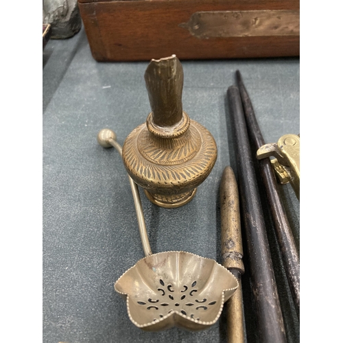 213 - A COLLECTION OF VINTAGE BRASS ITEMS TO INCLUDE POKERS, MATCHBOX HOLDERS, ETC