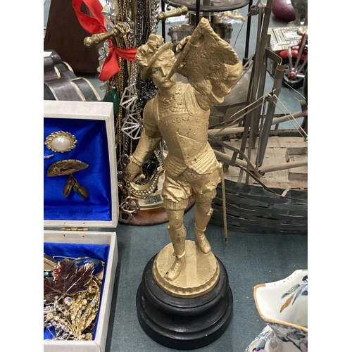 230 - A GILT DESIGN SPELTER ITALIAN TRUMPETEER ON PEDESTAL