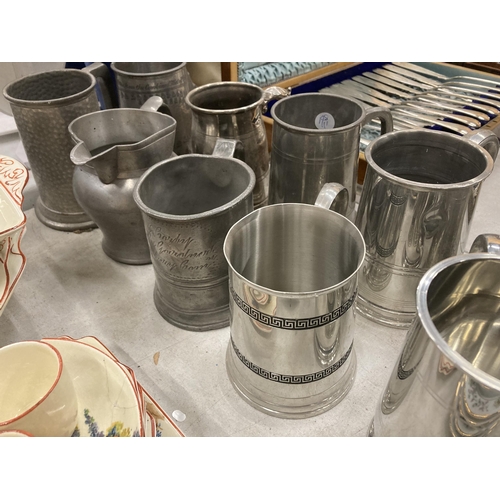 287 - A GROUP OF VINTAGE PEWTER TANKARDS